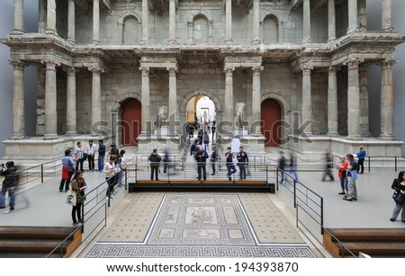 BERLIN - JUNE 3, 2013: Tourists inside the Pergamon Museum. The museum is visited by 1,135,000 people every year, making it the most visited art museum in Germany.