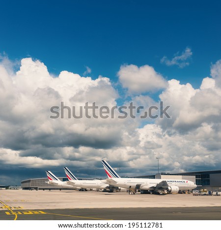 PARIS, FRANCE - MAY 13, 2014: Air France Jet airplanes at Charles de Gaulle airport. Air France is rated among the top 10 biggest airlines in the world and top 3 biggest airlines in Europe.