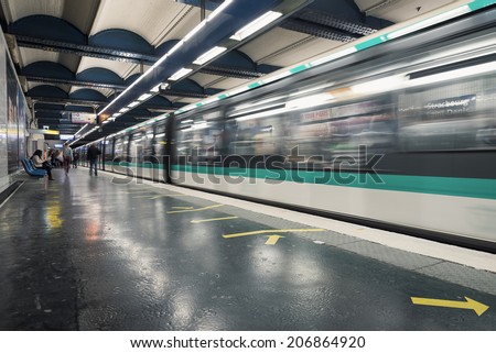 PARIS, FRANCE - MAY 16, 2014: Strasbourg Saint-Denis Metro Station. The Paris Metro is a rapid transit system in the Metropolitan Area. It is mostly underground (214 kilometres) and has 303 stations.