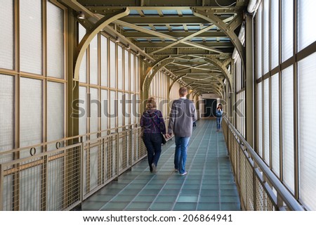 PARIS, FRANCE - MAY 17, 2014: Corridor inside the Musee d\'Orsay. Opened in 1986, it houses the largest collection of impressionist and post-impressionist masterpieces in the world.