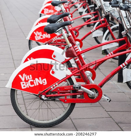 BARCELONA, SPAIN - MAY 31, 2014: Bicycle of the Cycle service in Barcelona sponsored by Vodafone. With the bicing sharing service people can rent bicycles for short trips.