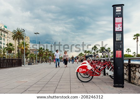 BARCELONA, SPAIN - MAY 31, 2014: Bicycle of the Cycle service in Barcelona sponsored by Vodafone. With the bicing sharing service people can rent bicycles for short trips.