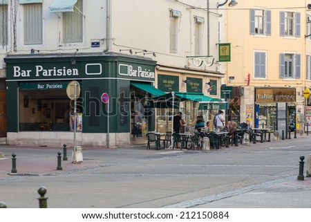 BOURG EN BRESSE, FRANCE - AUGUST 2, 2014: Street view. Bourg-en-Bresse is a commune in eastern France, capital of the Ain department. It is located 70 km (43 mi) north-northeast of Lyon.
