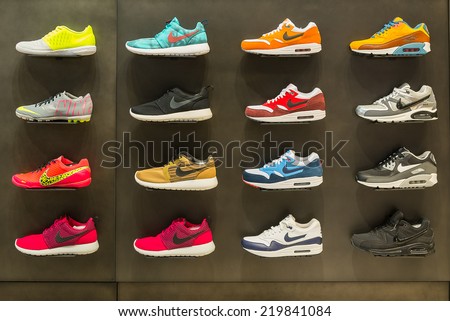 BOLOGNA, ITALY - SEPTEMBER 26 2014: Exposition of nike sport shoes. Nike is one of the world\'s largest suppliers of athletic shoes and apparel. The company was founded on January 25, 1964.