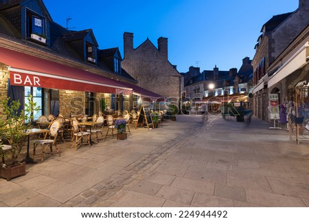 CONCARNEAU, FRANCE - AUGUST 10, 2014: Night view of the city. Concarneau (Breton: Konk Kerne, meaning Bay of Cornwall) is a commune in the Finistere department of Brittany in north-western France.