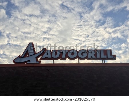 ANCONA, ITALY - NOVEMBER 14, 2014: Autogrill S.p.A restaurant and mini market sign on the A14 hiway. Autogrill is an Italian-based, multinational catering.