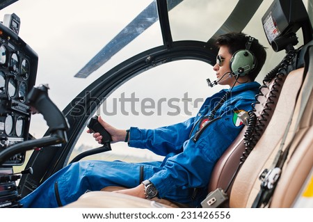 Young woman helicopter pilot.