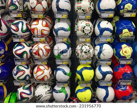 BOLOGNA, ITALY - NOVEMBER 19, 2014: Colorful soccer balls inside Decathlon Sport Store. Decathlon is the largest sporting goods reseller, founded in 1976.