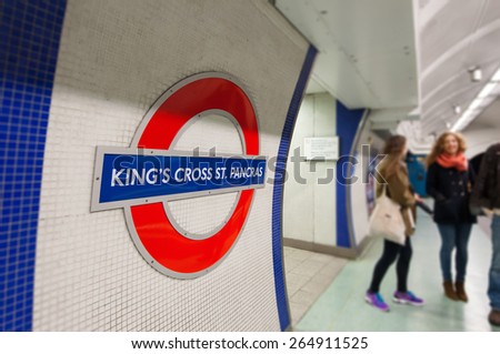 LONDON - APRIL 13, 2013: Inside Kings Cross Station. The Underground system serves 270 stations and has 402 kilometres (250 mi) of track, 45 per cent of which is underground.