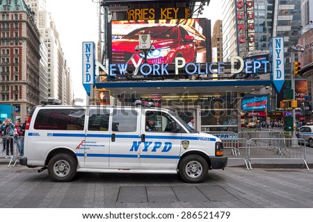NEW YORK CITY - CIRCA MAY 2015: NYPD Police van at Times Square. The New York City Police Department, established in 1845, is the largest municipal police force in the United States.