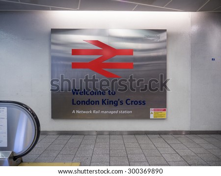 LONDON - JUNE 17, 2015: Network Rail symbol inside King's Cross railway station, a major London railway terminus which opened in 1852 on the northern edge of central London.