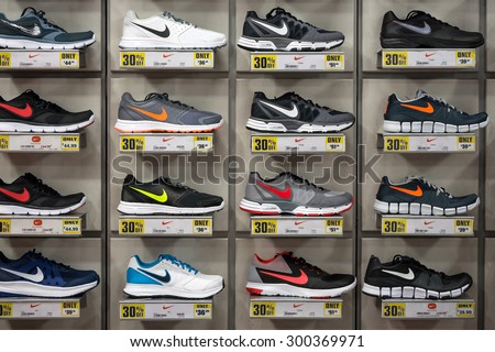 LONDON, UNITED KINGDOM - JUNE 17, 2015: Exposition of nike sport shoes. Nike is one of the world\'s largest suppliers of athletic shoes and apparel. The company was founded on January 25, 1964.