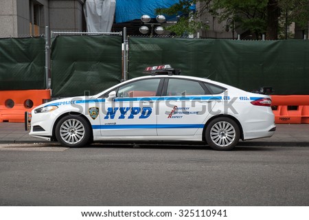 NEW YORK - MAY 20, 2015: NYPD Police car in Manhattan. The New York City Police Department, established in 1845, is the largest municipal police force in the United States.