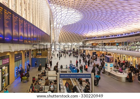 LONDON - APRIL 13, 2013: People walking inside King\'s Cross railway station. The annual rail passenger usage between 2011 - 2012 was 27.874 million.