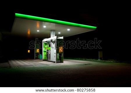 Gas station at night.