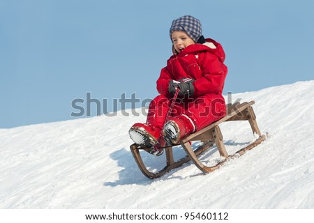 kid sledding