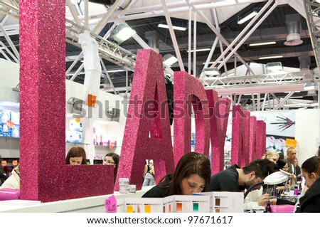 BOLOGNA, ITALY - MARCH 12: People visit Cosmoprof exhibition, the largest beauty and cosmetic sector trade show in Italy with more than 170.000 attendees on March 12, 2012 in Bologna, Italy.