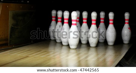 bowling - twelve white pins before the strike
