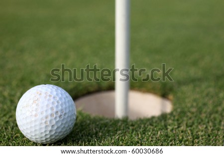golf - white ball and tee