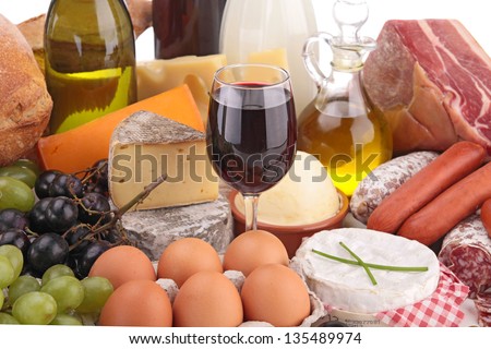 composition with wine,cheese,bread,meat