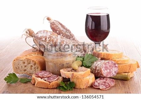 composition with wine,meat spread and sausages