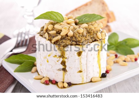 cheese with pesto and pine nut