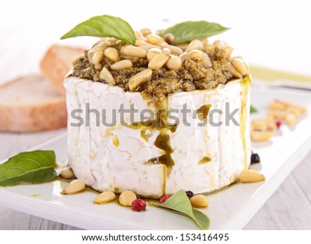 cheese with pesto and pine nut