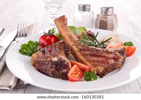grilled lamb chop and vegetables