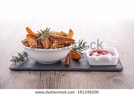 potato wedges and ketchup