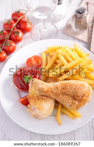 roast chicken leg and fries