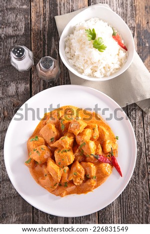 chicken cooked with curry sauce and rice