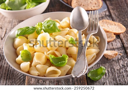pasta, fresh salad and bread