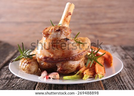 roasted lamb meat and vegetables