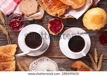 breakfast with coffee cup and pastries