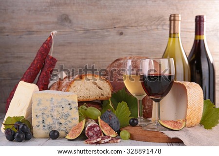 assorted wine,bread and cheese