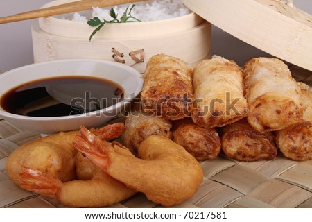 asia food, spring roll, fritter shrimp, rice and sauce