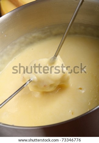 close up on cheese fondue