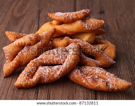 deep-fried pastry on wooden background