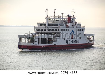 SOUTHAMPTON, HAMPSHIRE, UK - JULY 11, 2014: the isle of wight passenger ferry, red falcon, travelling from southampton to ryde