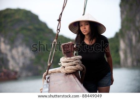 Asian woman on boat