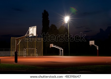 Night Shot Of Basketball Court with Nice Lens Flare