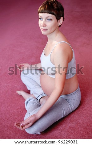 pregnant woman doing pregnancy yoga