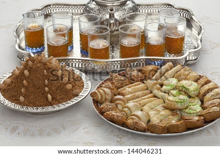 Traditional Moroccan tea,cookies and almond sellou at id-al-fitr the end of Ramadan