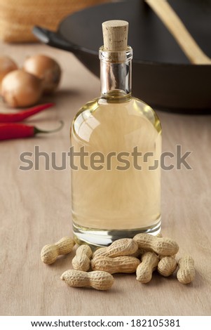 Bottle of peanut oil ready to use for a salad