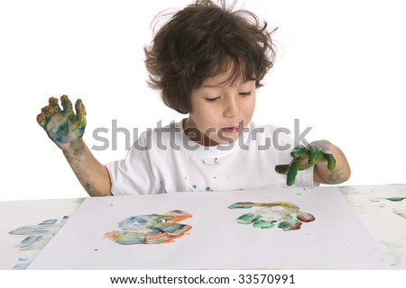 Little boy is finger painting