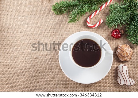 Cup of coffee with cakes of Christmas