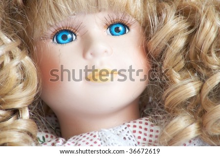 Porcelain Doll with blue eyes