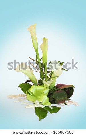 calla lily bouquet in the background