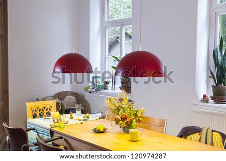interior of a modern living-dining room in a country style home