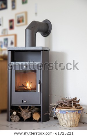 modern wood burning stove inside cozy living room